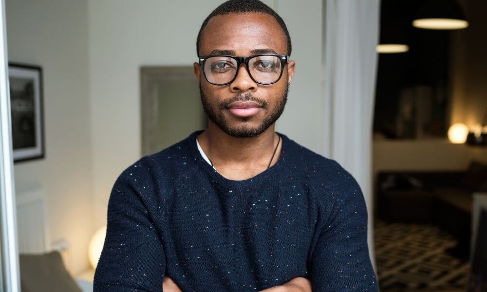 Black man with glasses